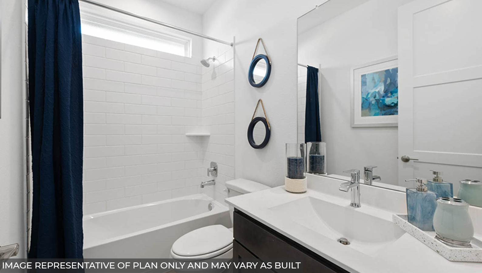 Staged secondary bathroom with vinyl flooring.