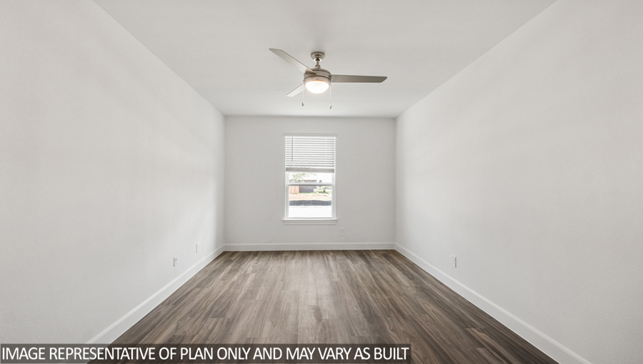 Private study with vinyl flooring, a bright window, and a ceiling fan.