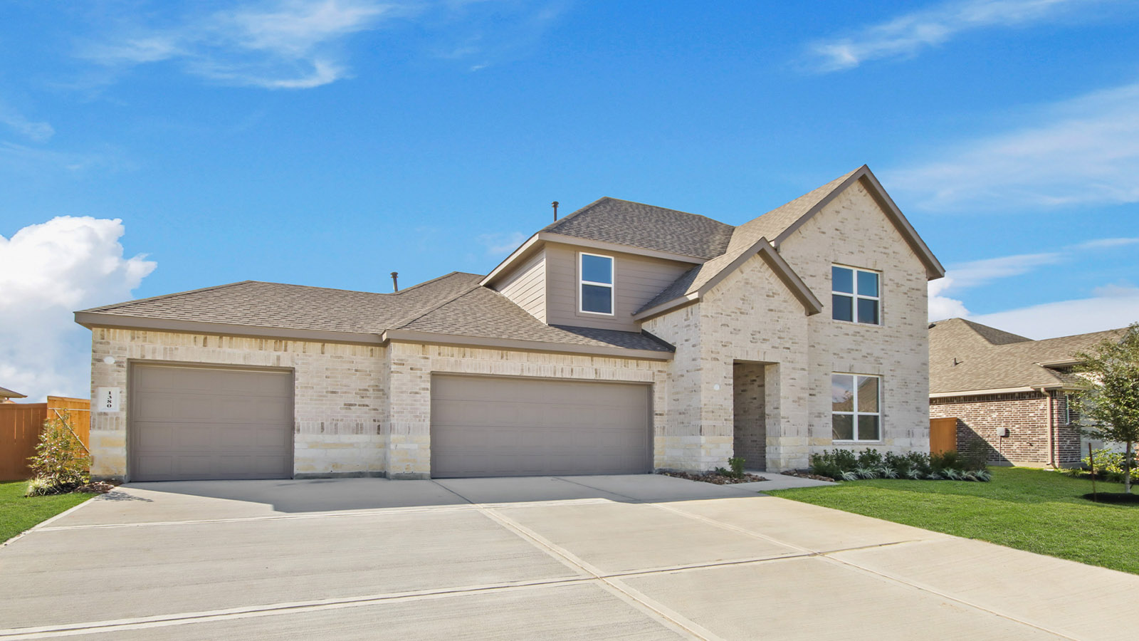 Two story home with three car garage