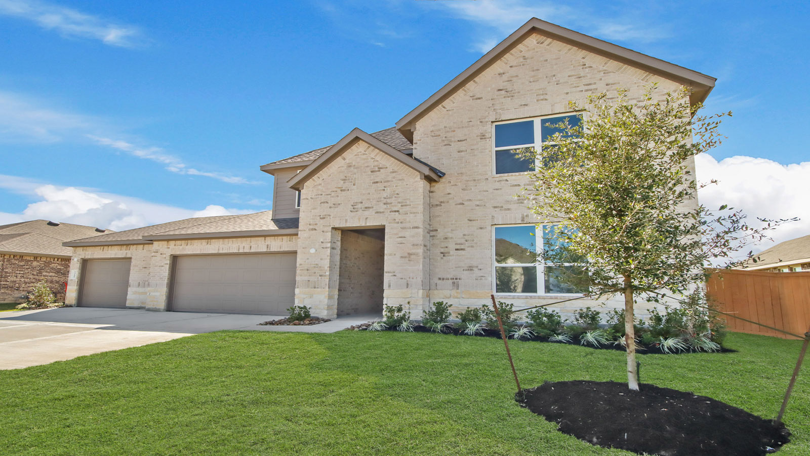 Two story home with three car garage