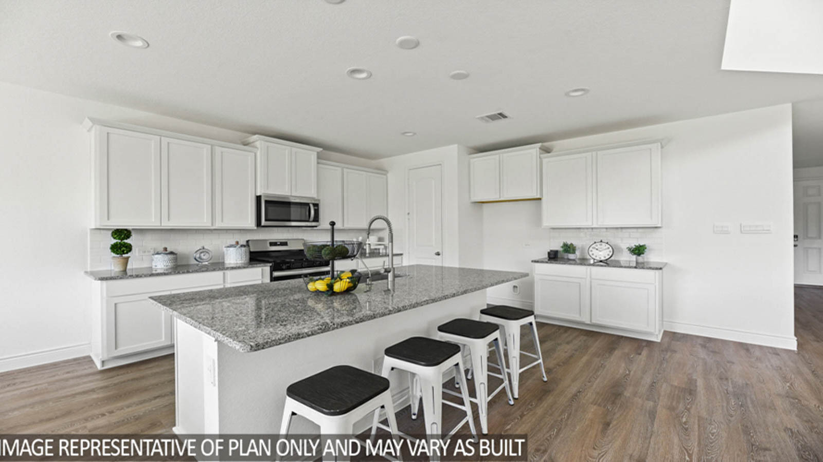 Open concept living, dining, and kitchen area