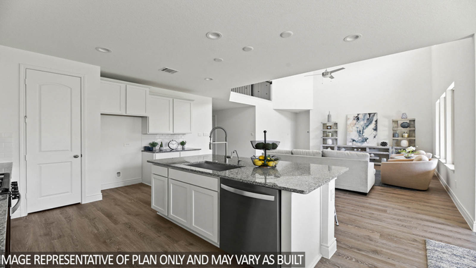 Open concept living, dining, and kitchen area