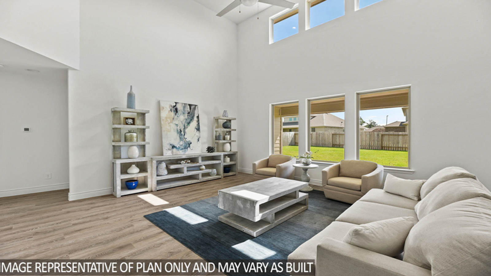 Open concept living, dining, and kitchen area