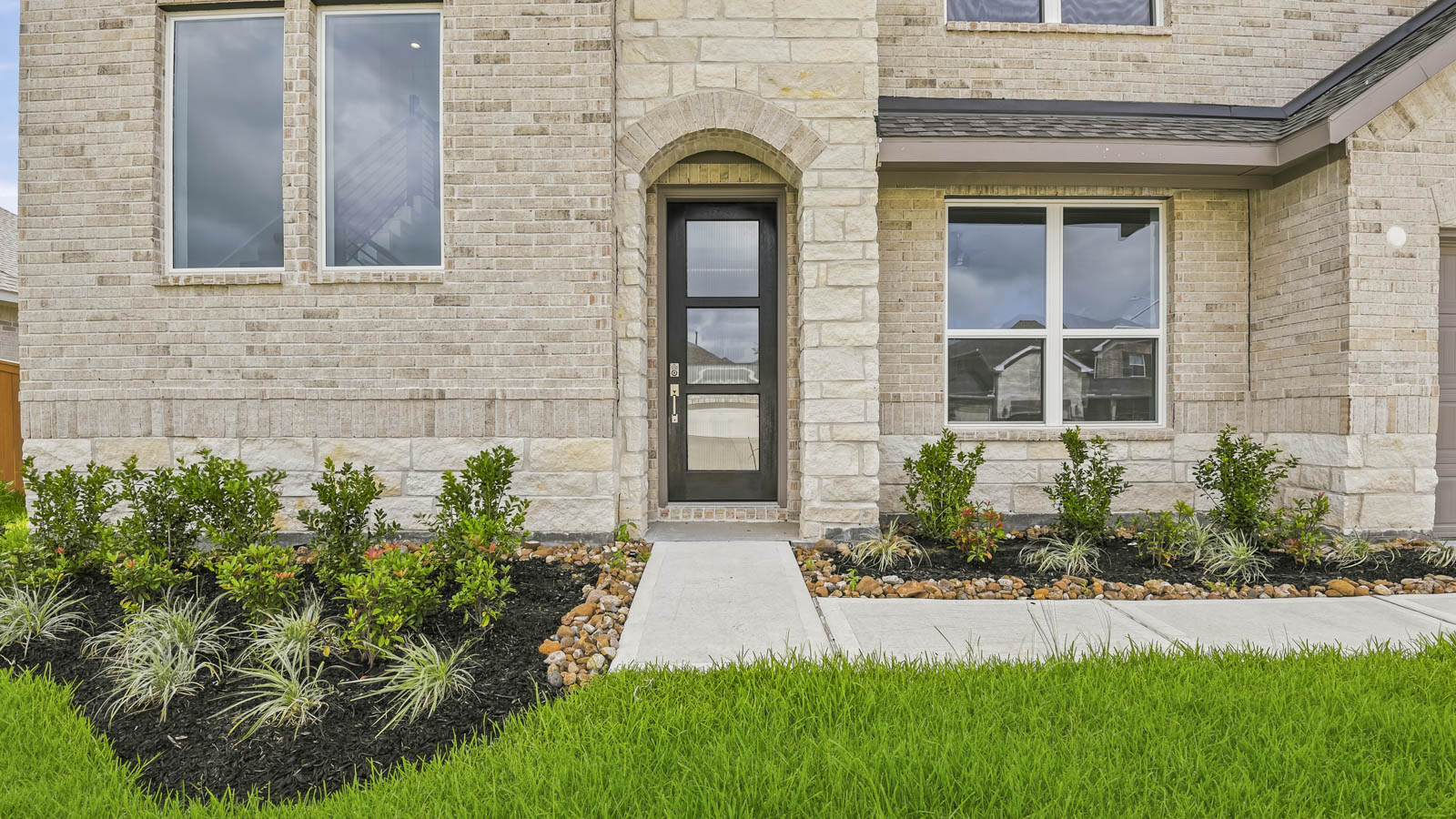 Two story home with three car garage