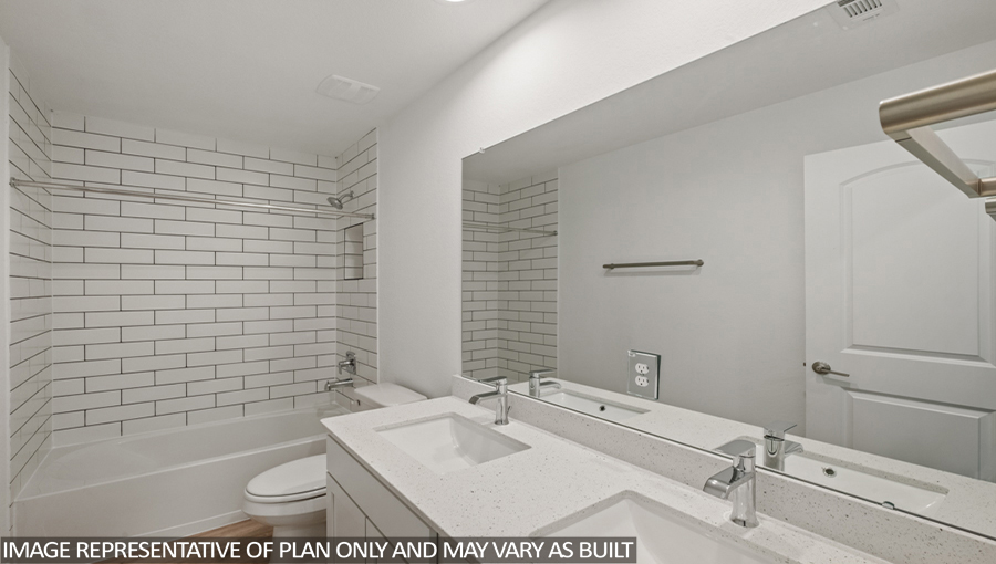 Secondary bathroom with a tile tub/shower combo.