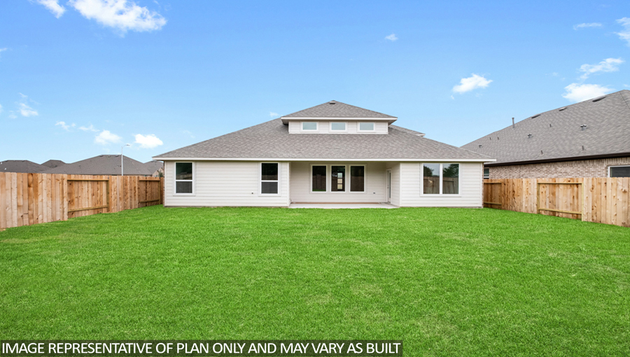 Spacious backyard with back patio and overhead lights.