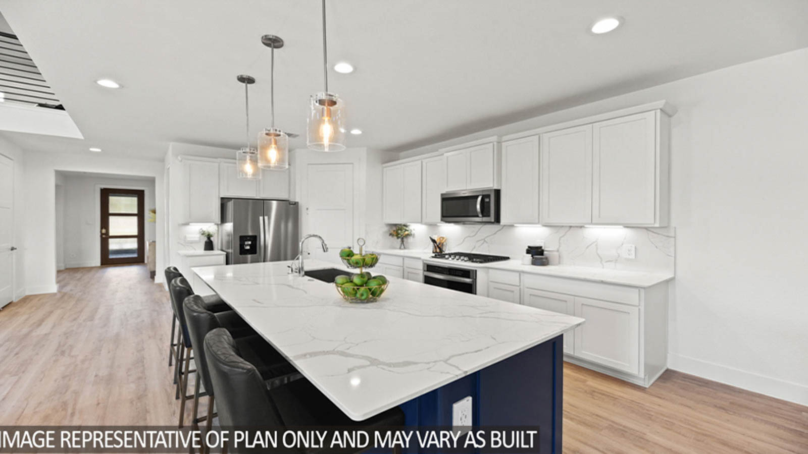 Open concept living, dining, and kitchen area