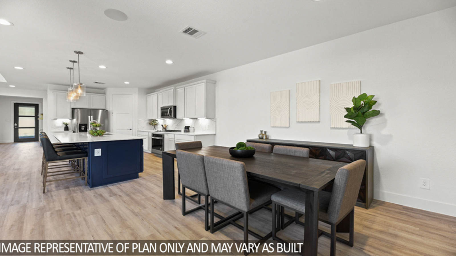 Open concept living, dining, and kitchen area