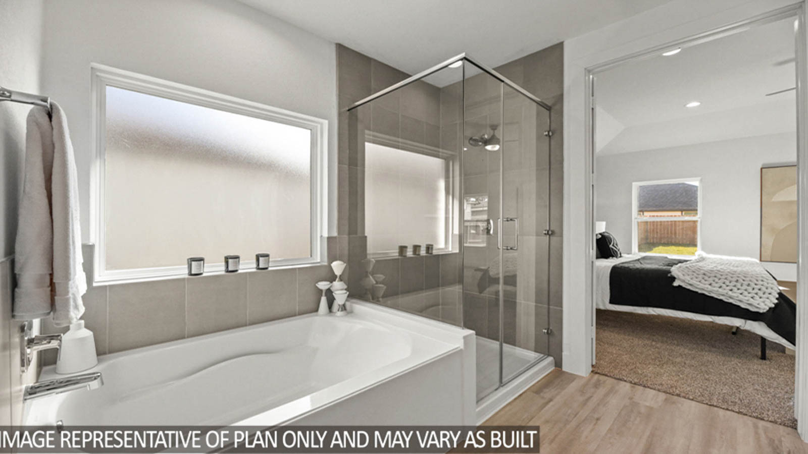 Primary bathroom with tub and shower