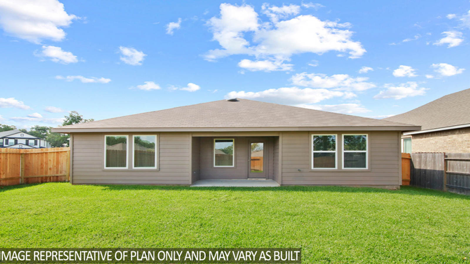 Spacious backyard with back patio and overhead light.