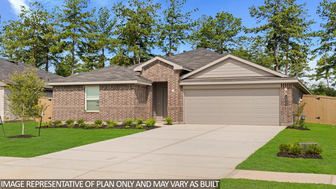 Single-story home with brown brick and tan details.