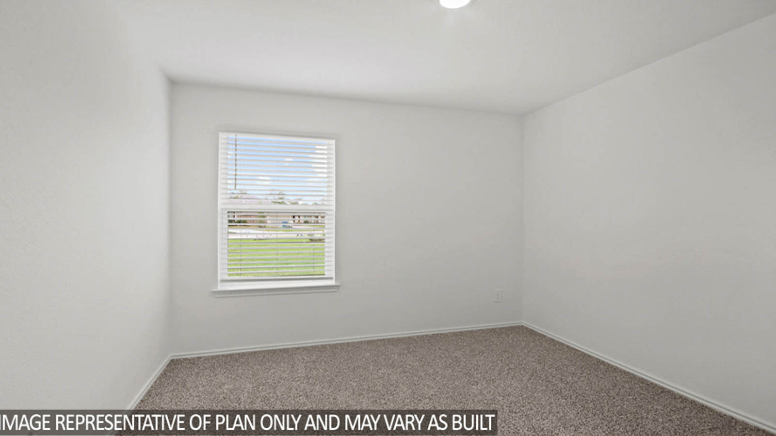 Secondary bedroom with carpet flooring and a bright window.