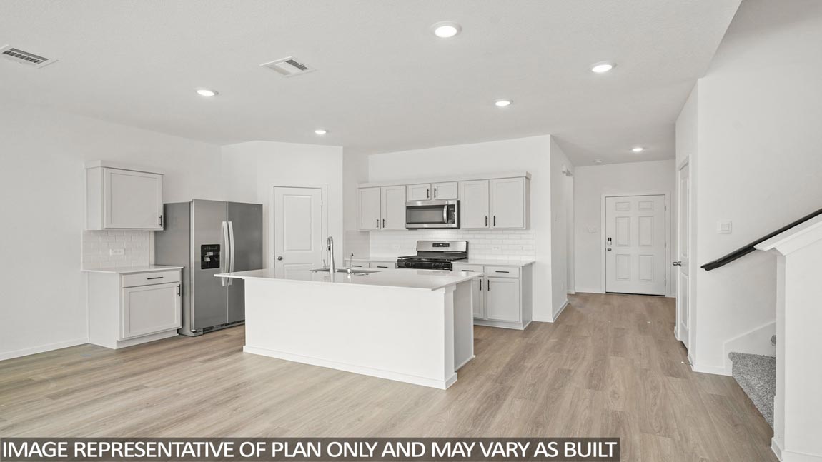 Open concept living, dining, and kitchen area