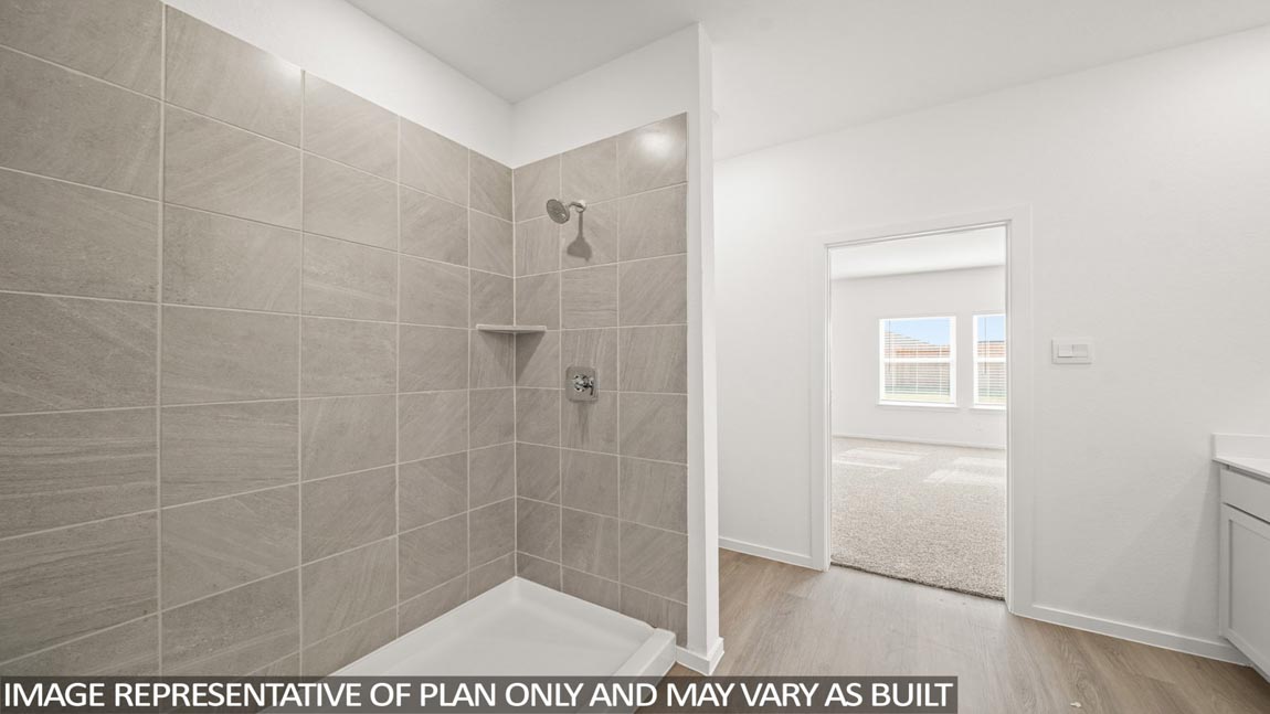 Primary bathroom with shower and linen storage