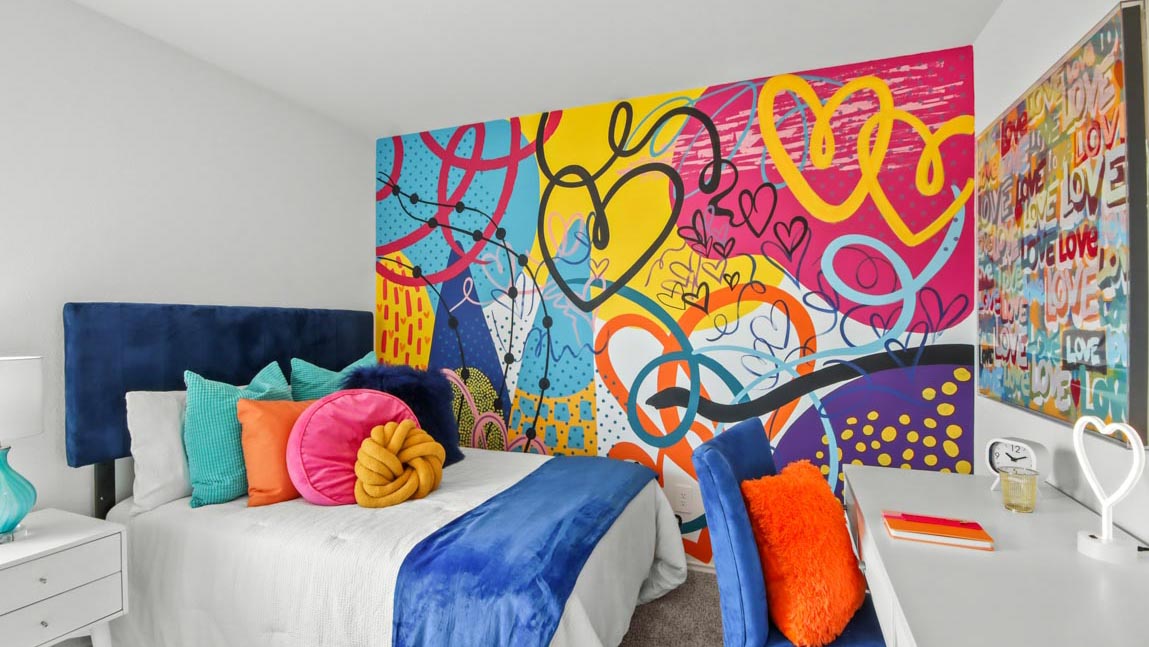 Secondary bedroom with carpet flooring