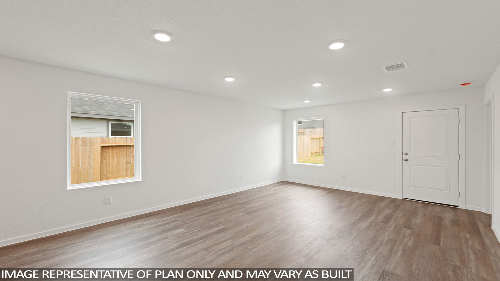 Open concept living, dining, and kitchen area