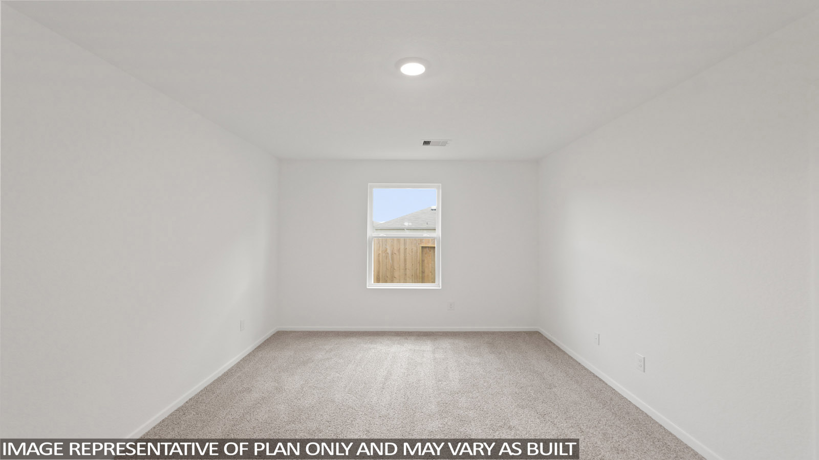 Primary bedroom with carpet flooring