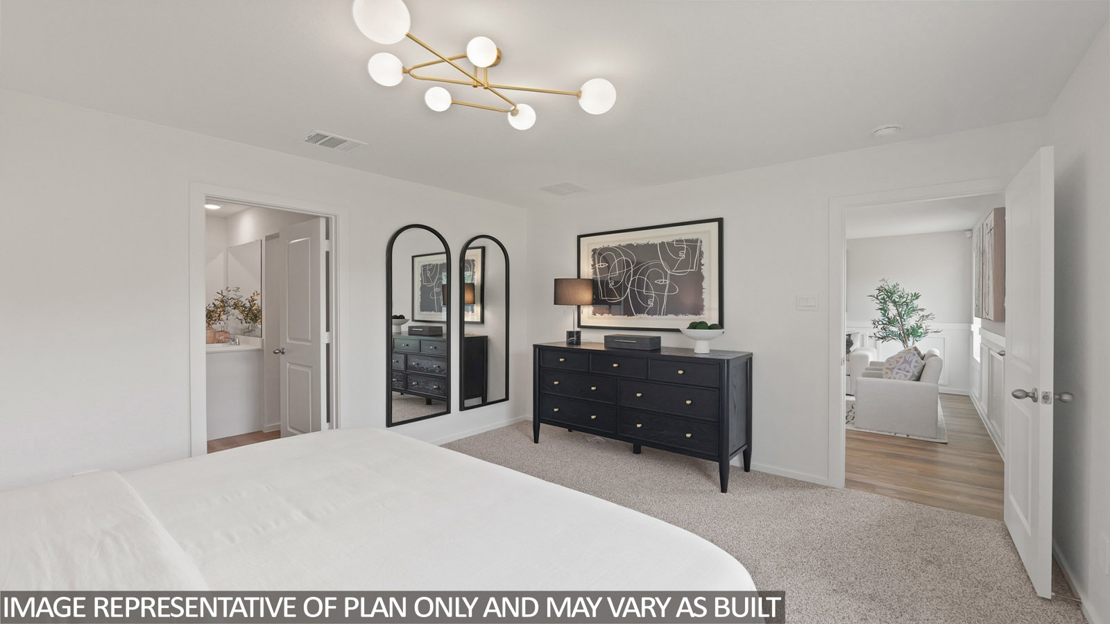 Primary bedroom with carpet flooring