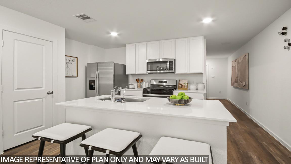 Open concept living, dining, and kitchen area