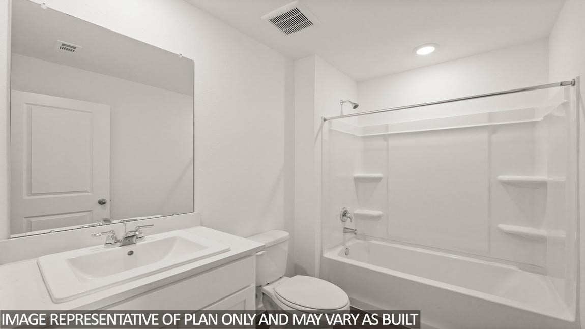 Secondary bathroom with vinyl flooring and a tile tub/shower combo.