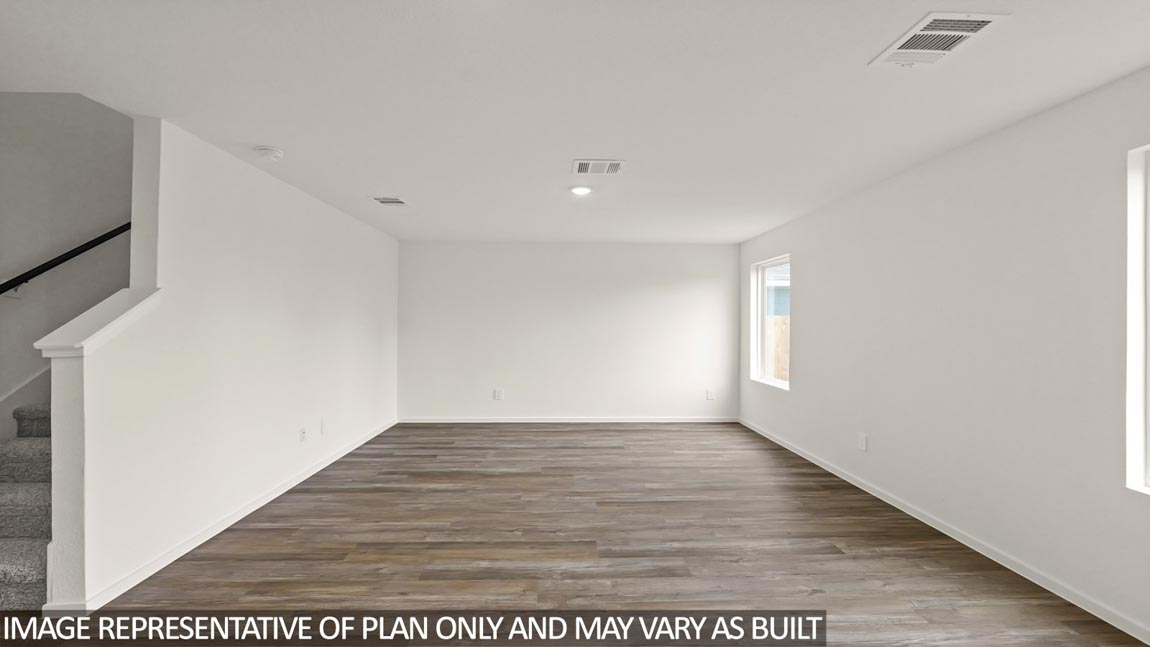 Open concept living, dining, and kitchen area