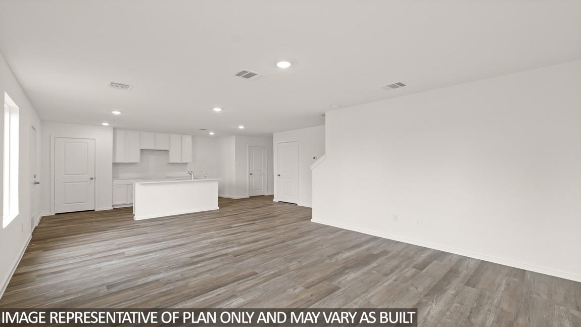 Open concept living, dining, and kitchen area