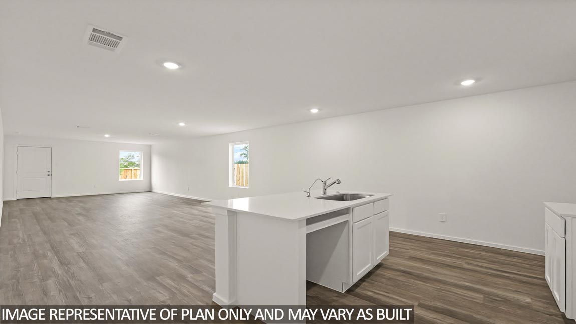 Open concept living, dining, and kitchen area