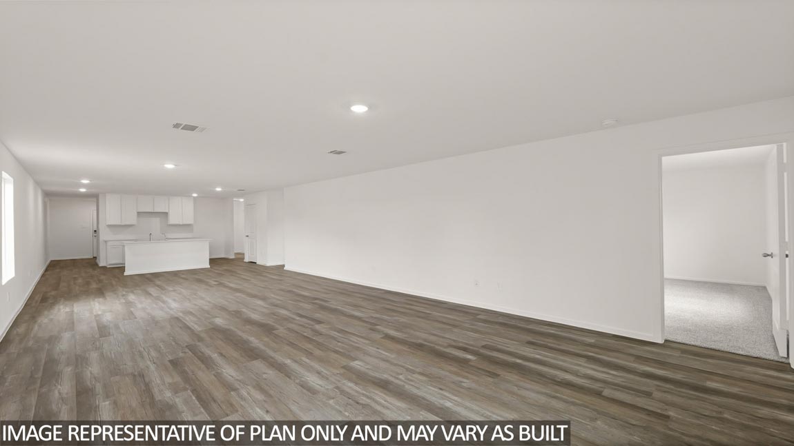 Open concept living, dining, and kitchen area