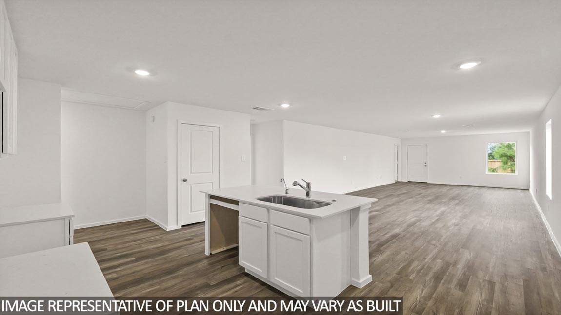 Open concept living, dining, and kitchen area