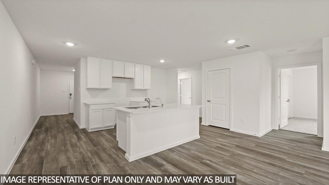 Open concept living, dining, and kitchen area