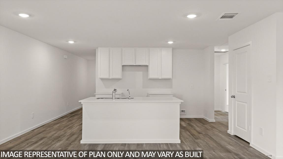 Open concept living, dining, and kitchen area