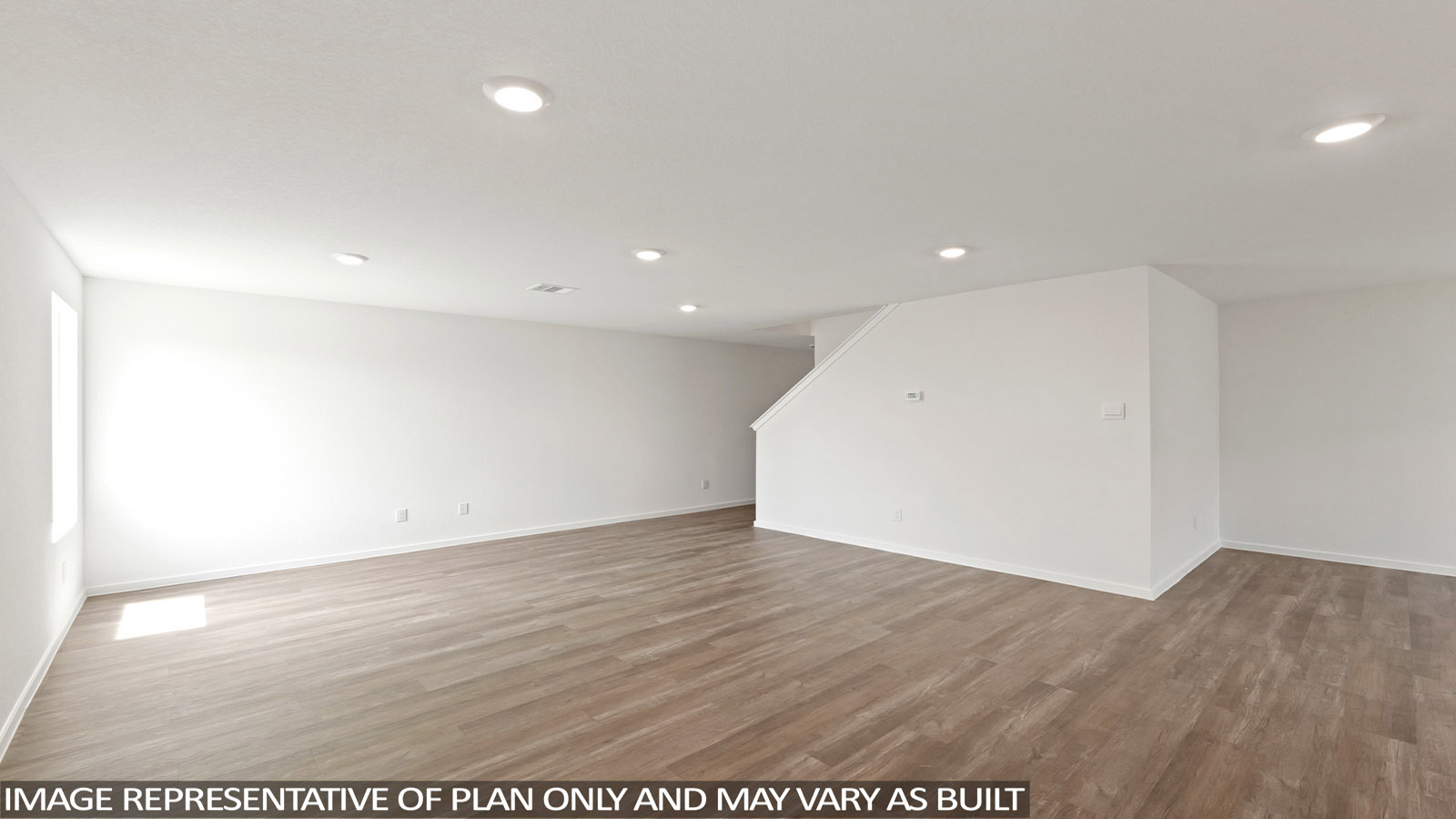 Open concept living, dining, and kitchen area