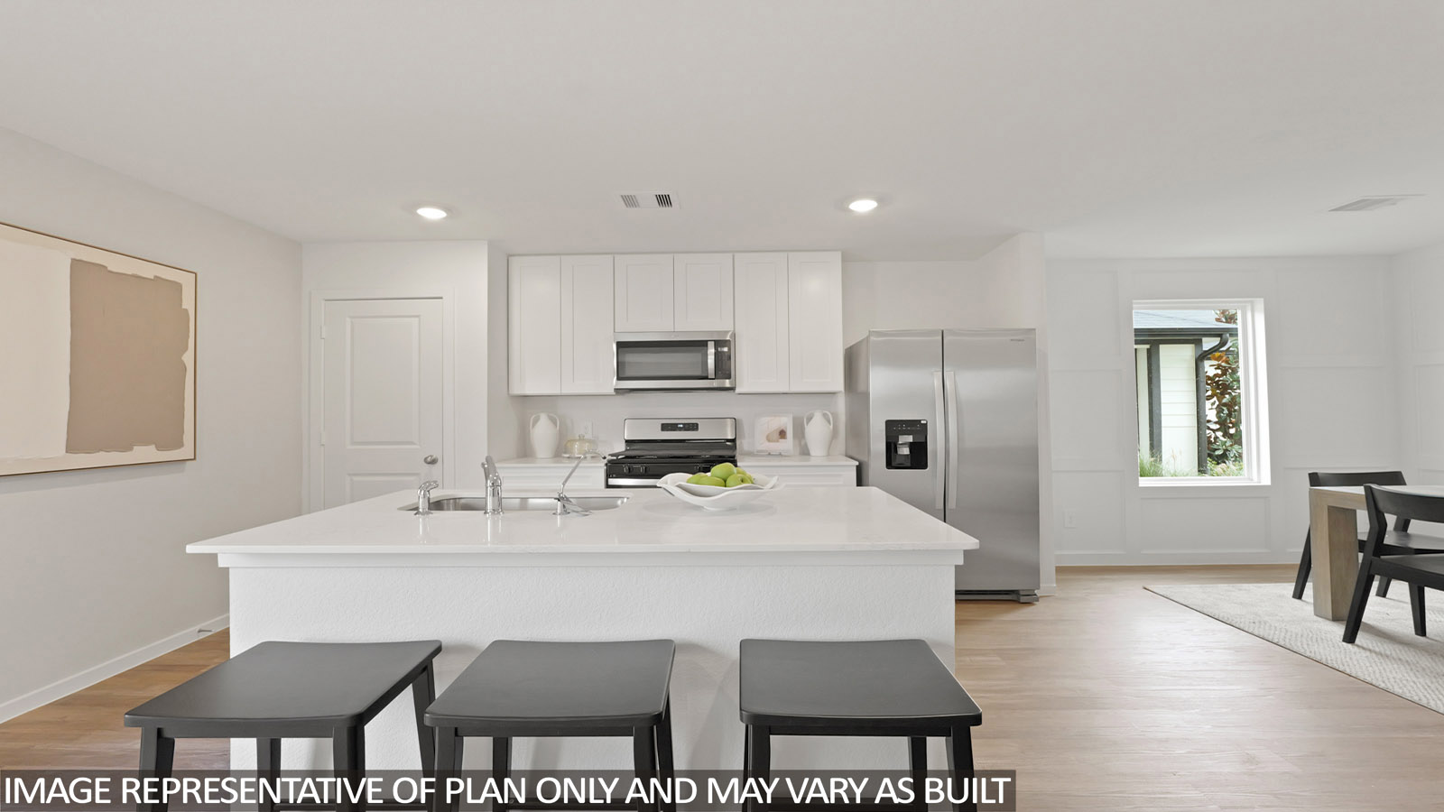 Open concept living, dining, and kitchen area