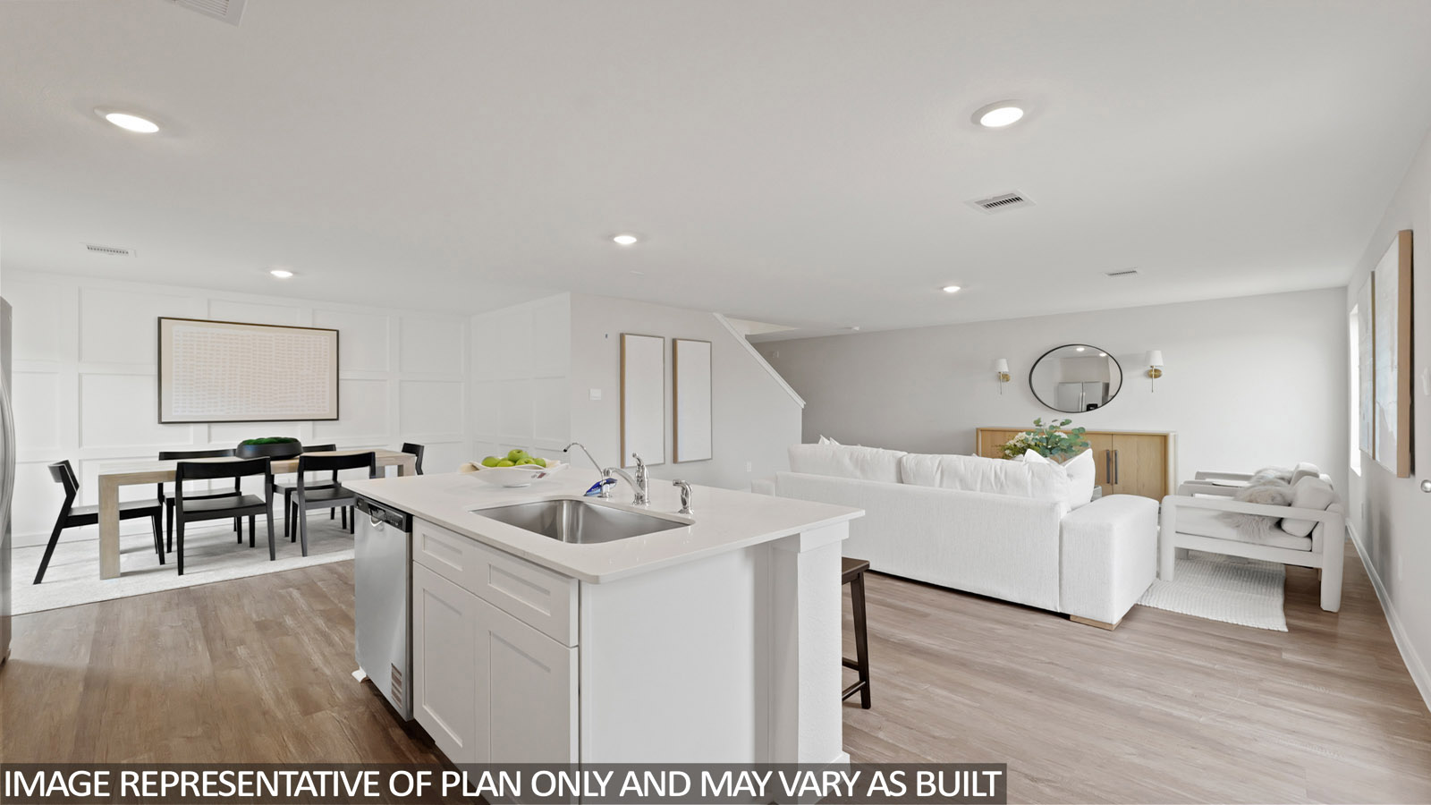 Open concept living, dining, and kitchen area