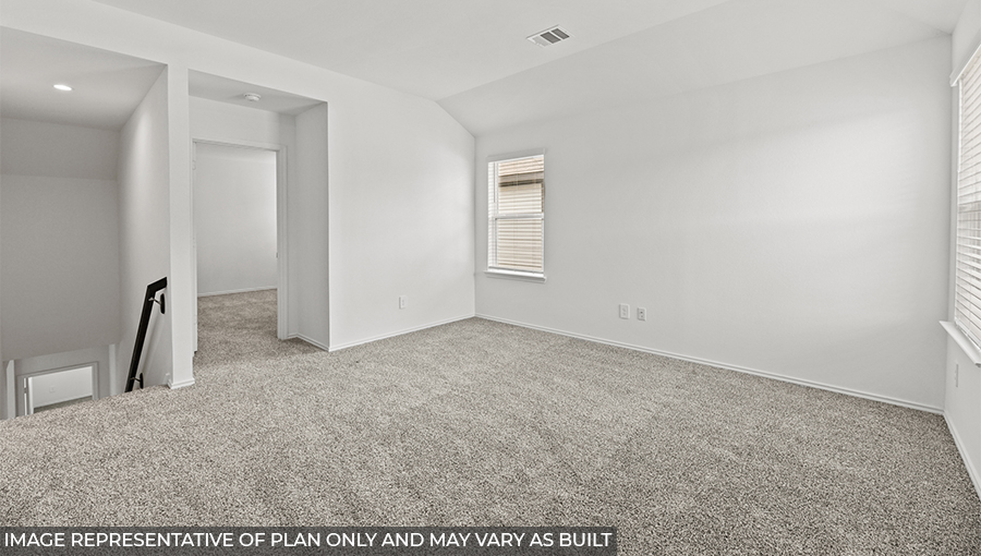 Second story game room with carpet flooring