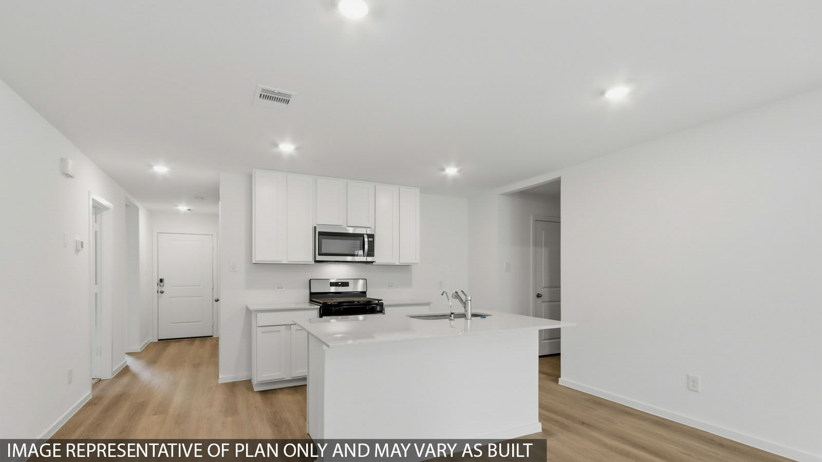 Open concept living, dining, and kitchen area
