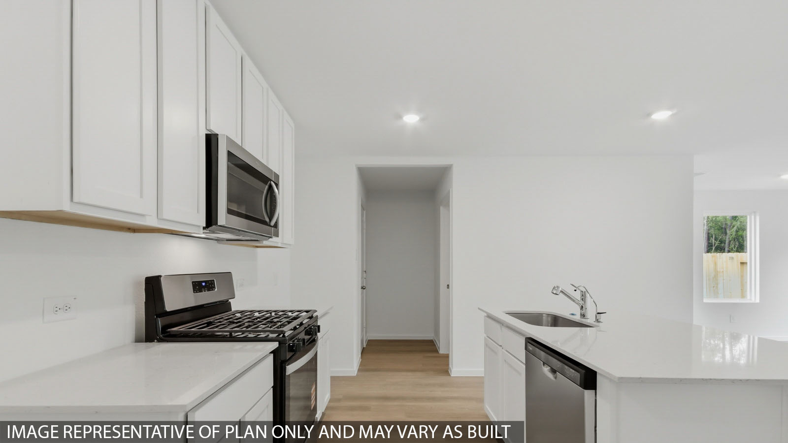 Open concept living, dining, and kitchen area