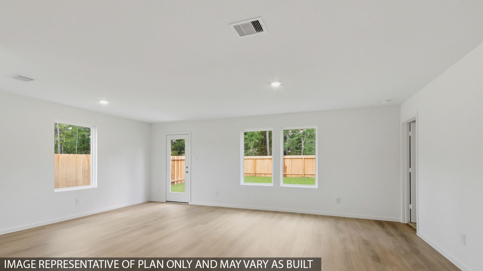 Open concept living, dining, and kitchen area