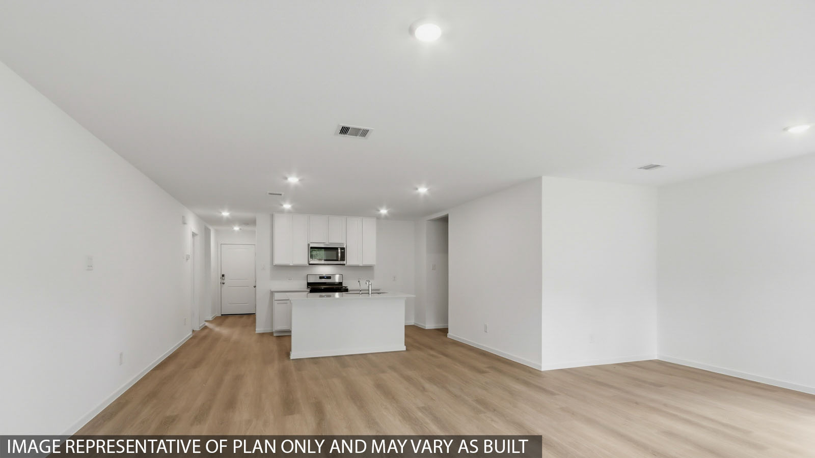 Open concept living, dining, and kitchen area