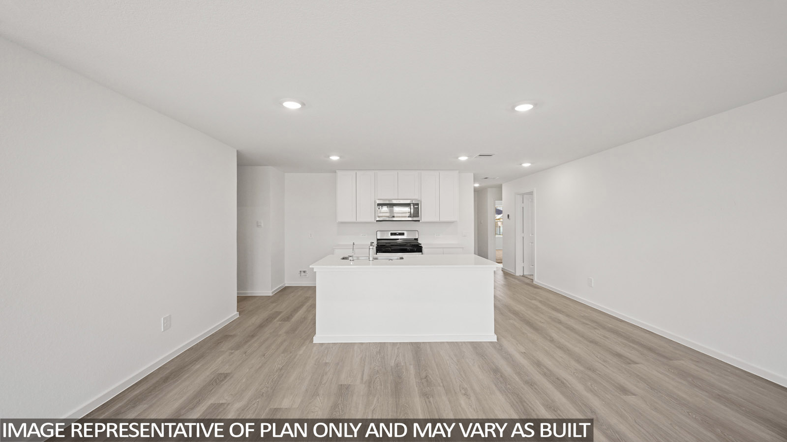 Open concept living, dining, and kitchen area