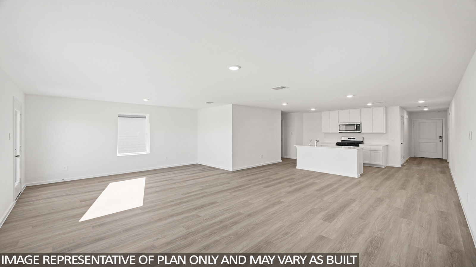 Open concept living, dining, and kitchen area