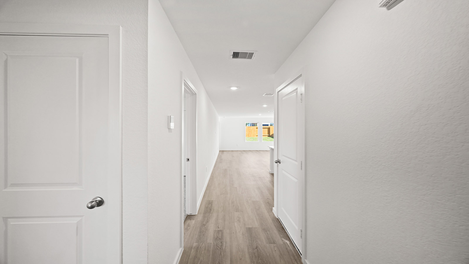 Entry hallway with vinyl flooring