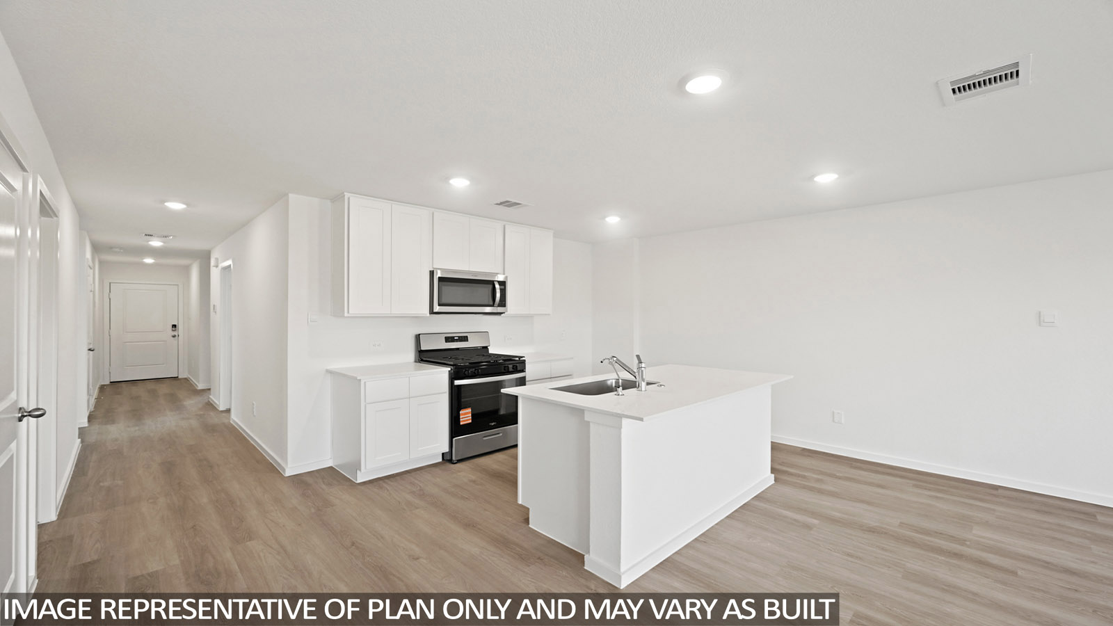 Open concept living, dining, and kitchen area