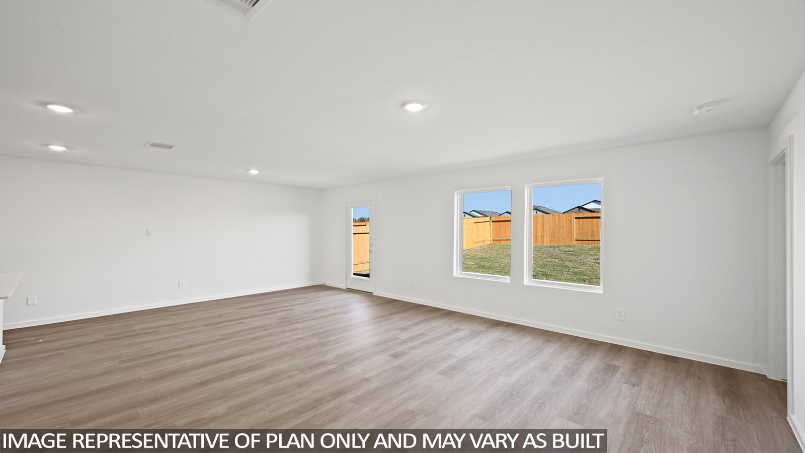 Open concept living, dining, and kitchen area