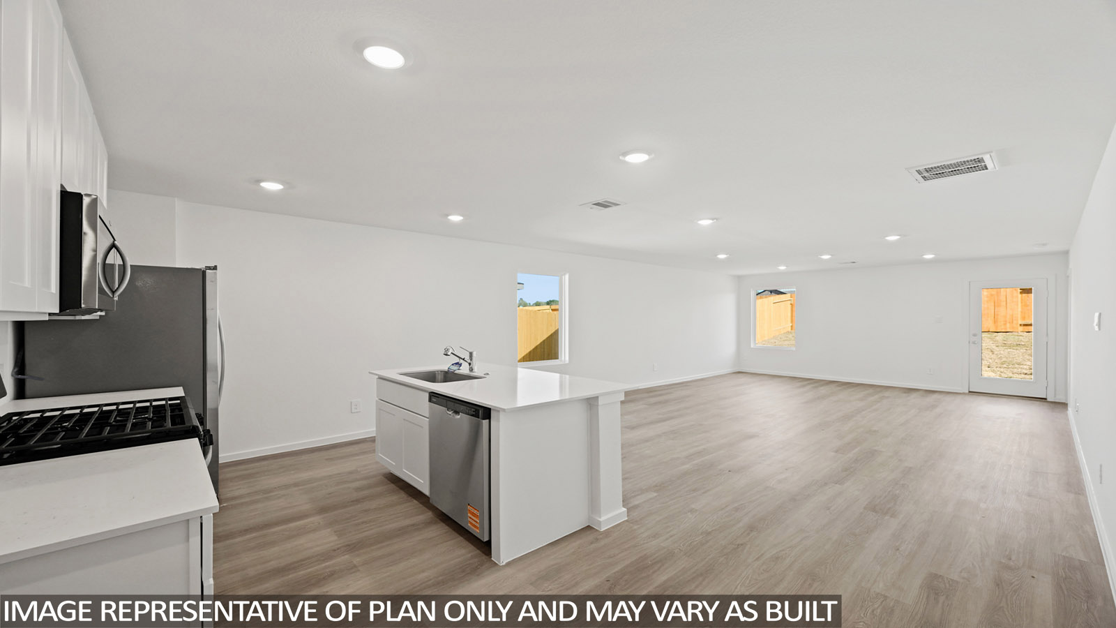 Open concept living, dining, and kitchen area