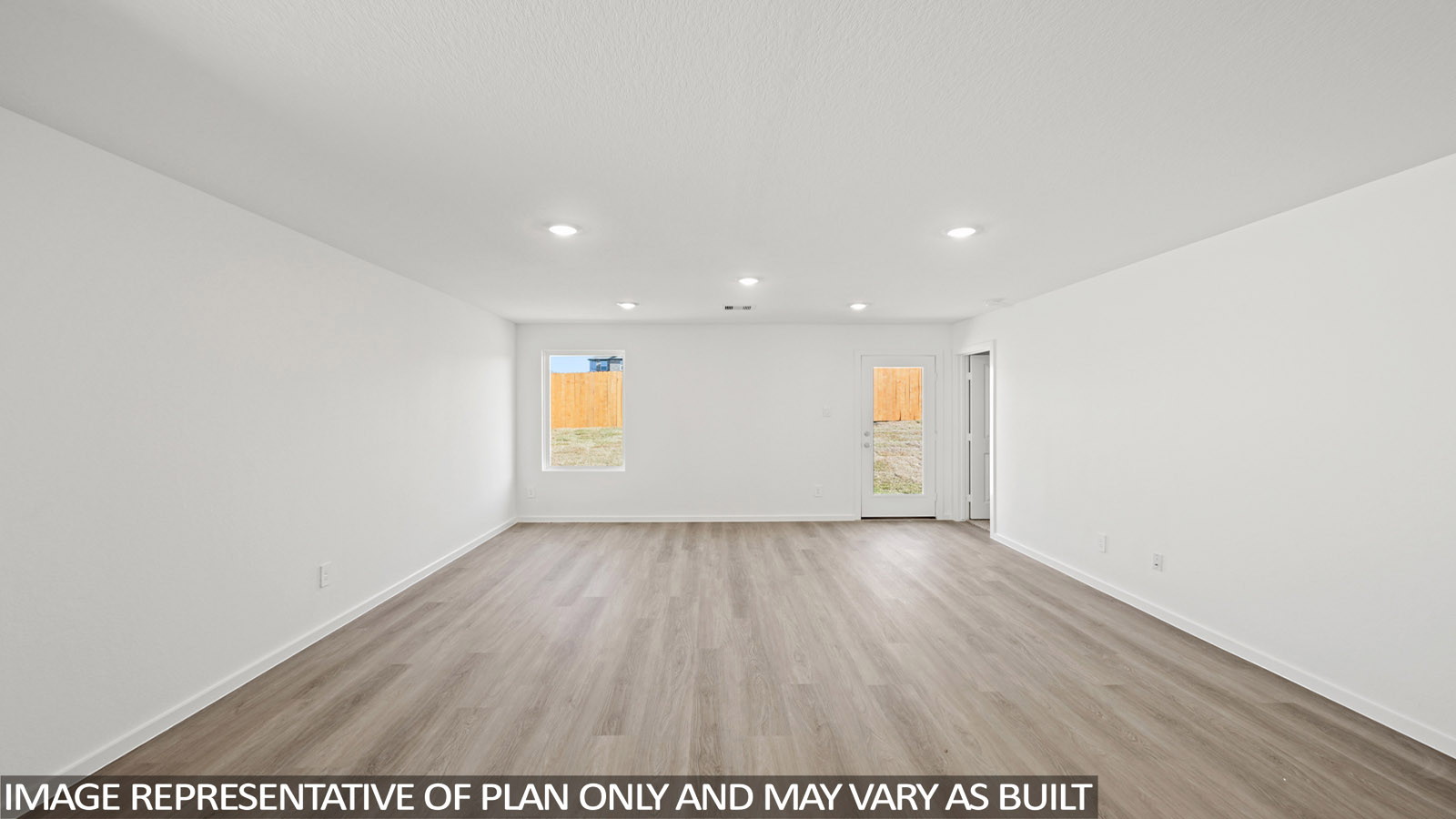 Open concept living, dining, and kitchen area