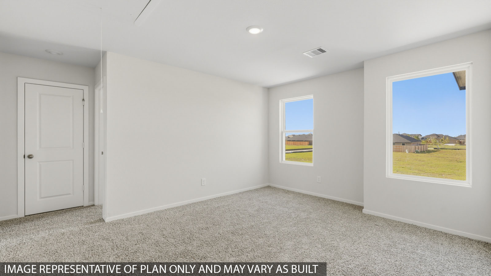 Second story game room with carpet flooring