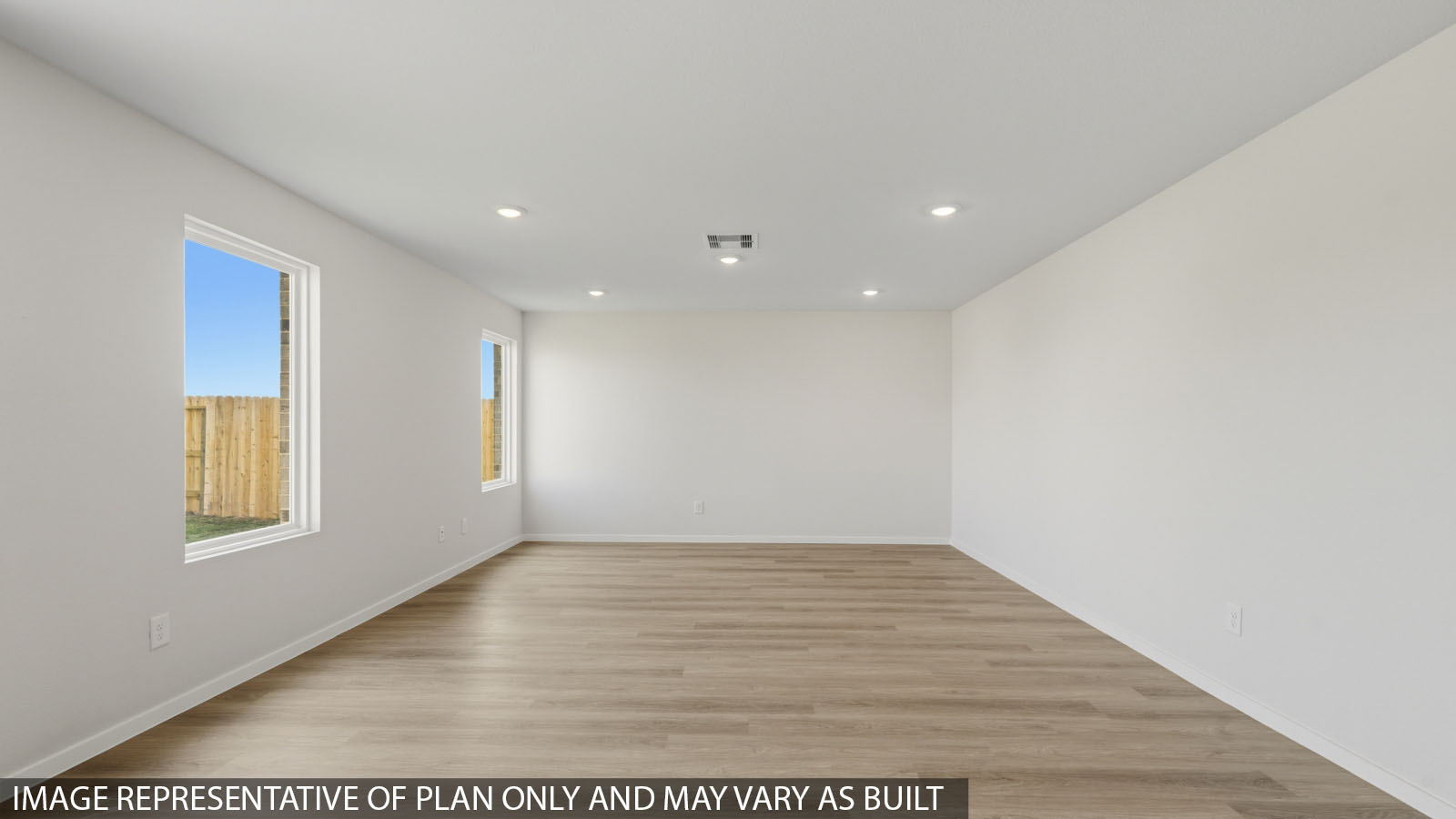 Open concept living, dining, and kitchen area