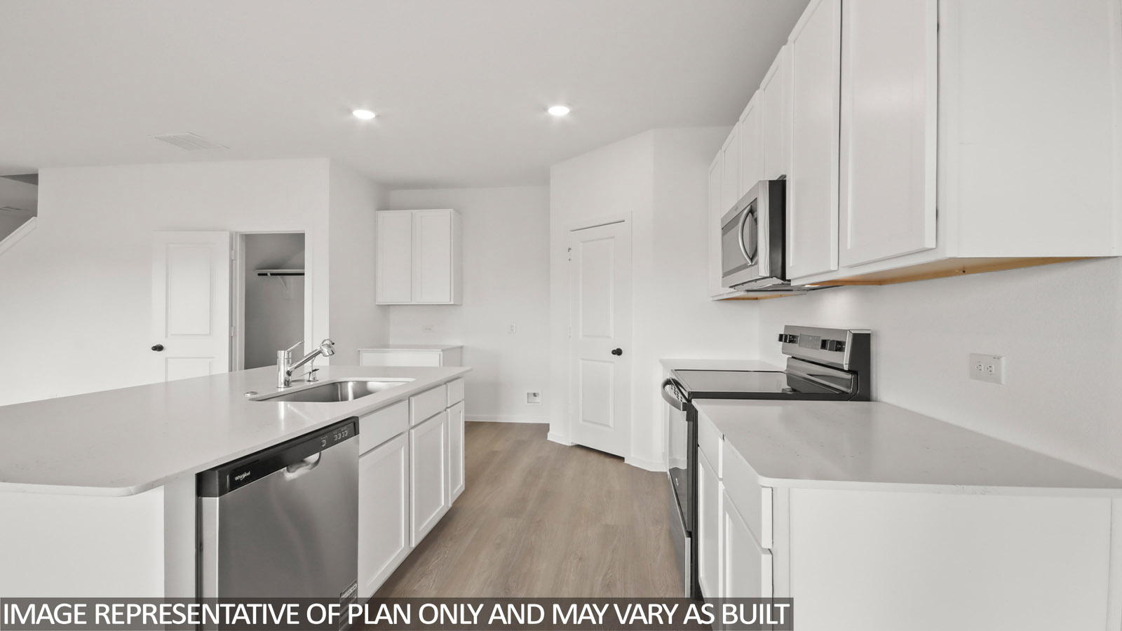 Open concept living, dining, and kitchen area