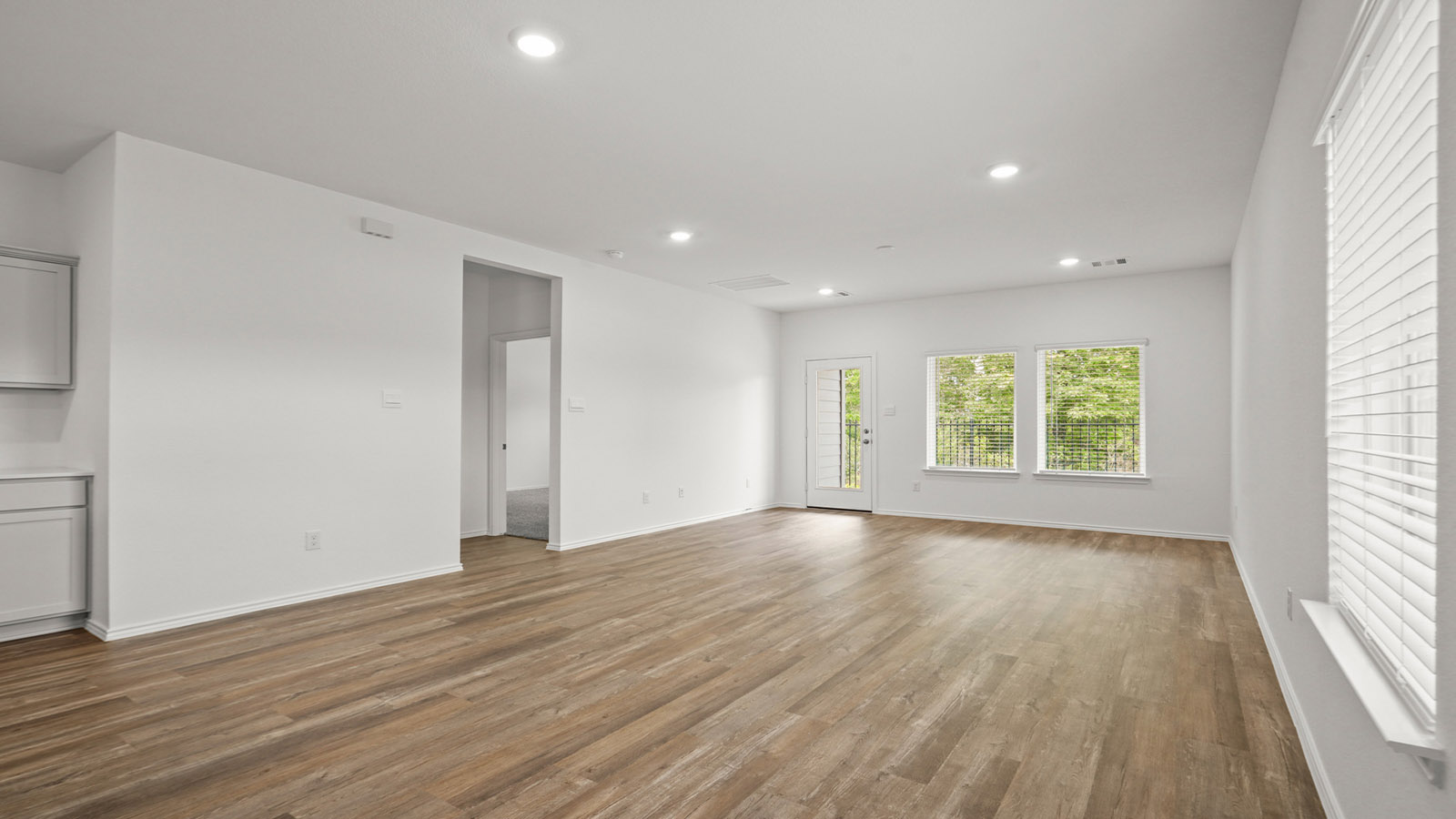 Open concept living, dining, and kitchen area